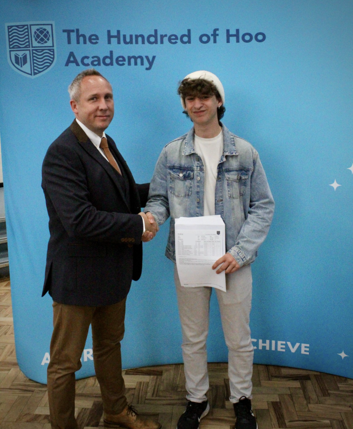 Students holding their results